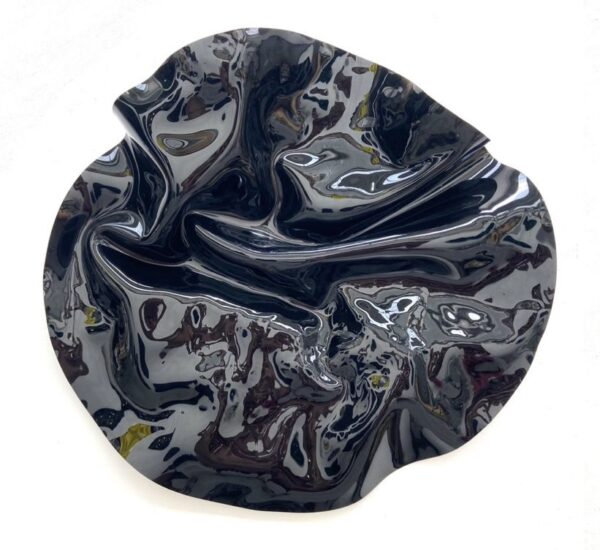 c375ea69-16cc-4525-9b98-22ba19ce5a28 Escultura metálica redonda